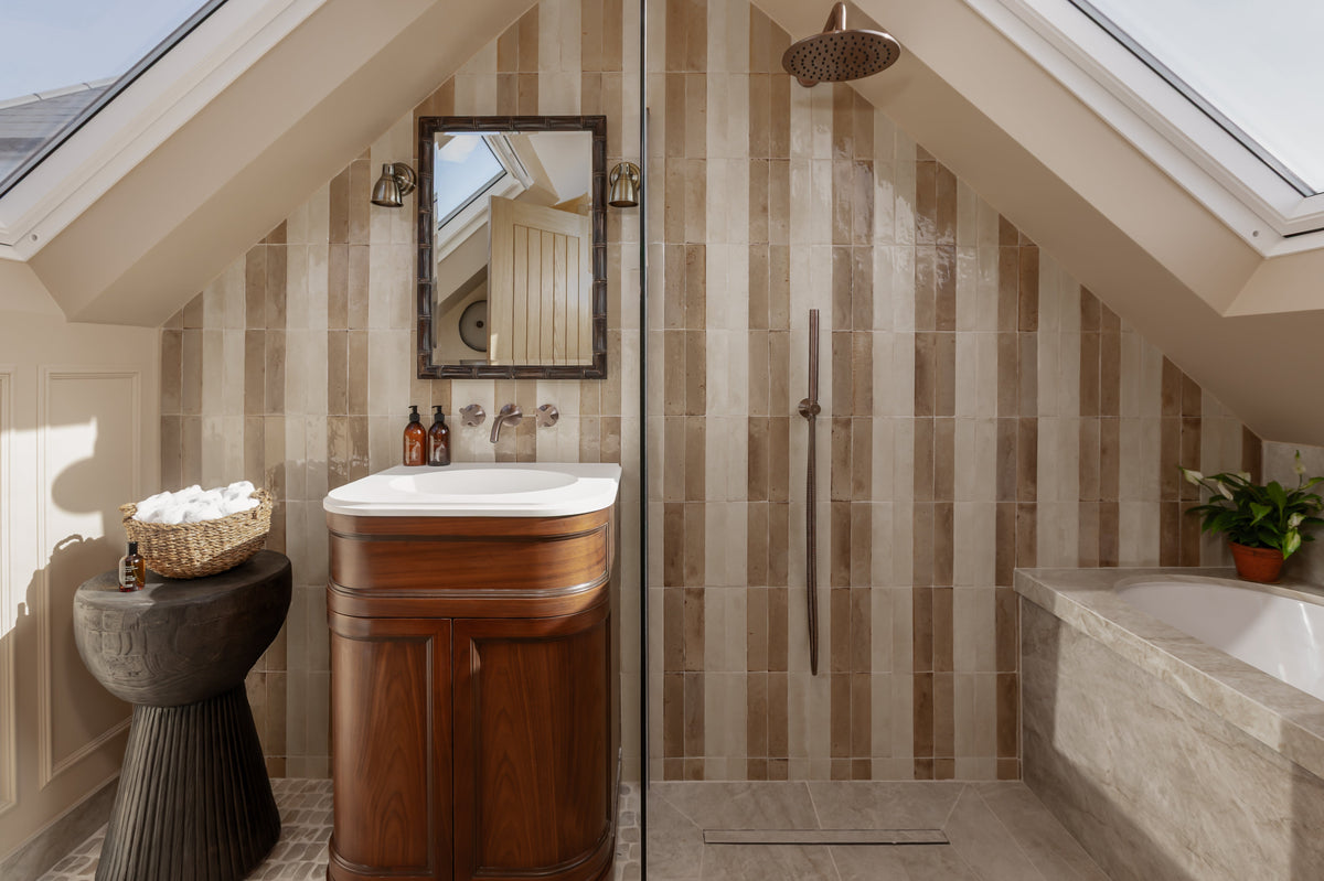 Striped zellige tile bathroom with roof window and freestanding vanity