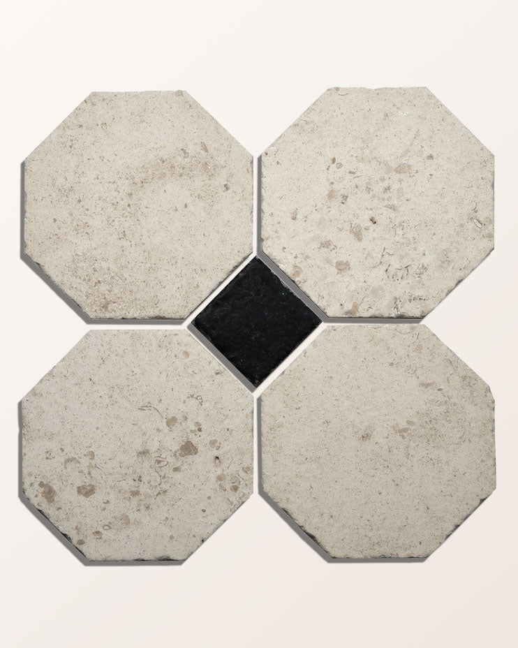 Four Limoges Limestone Vintaged Finish octagons arranged around a single Tora Blue Limestone Vintaged Cabochon