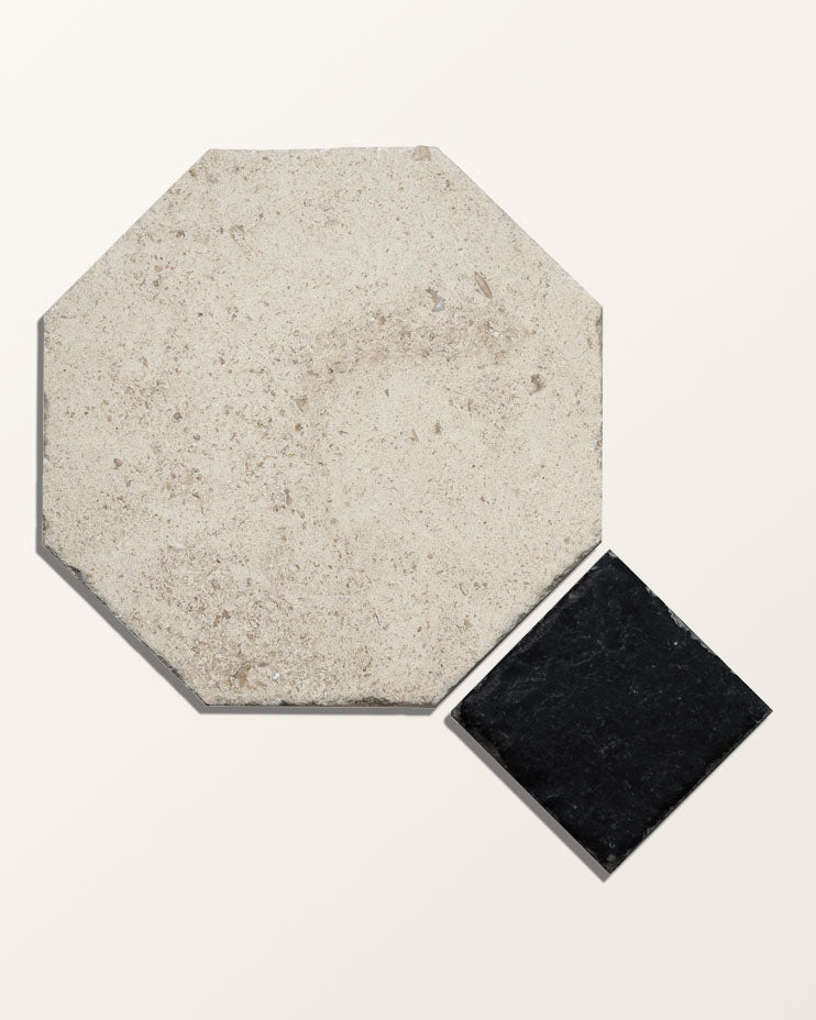 A single Limoges Limestone Vintaged Finish octagon shown with a Tora Blue Limestone Vintaged Cabochon