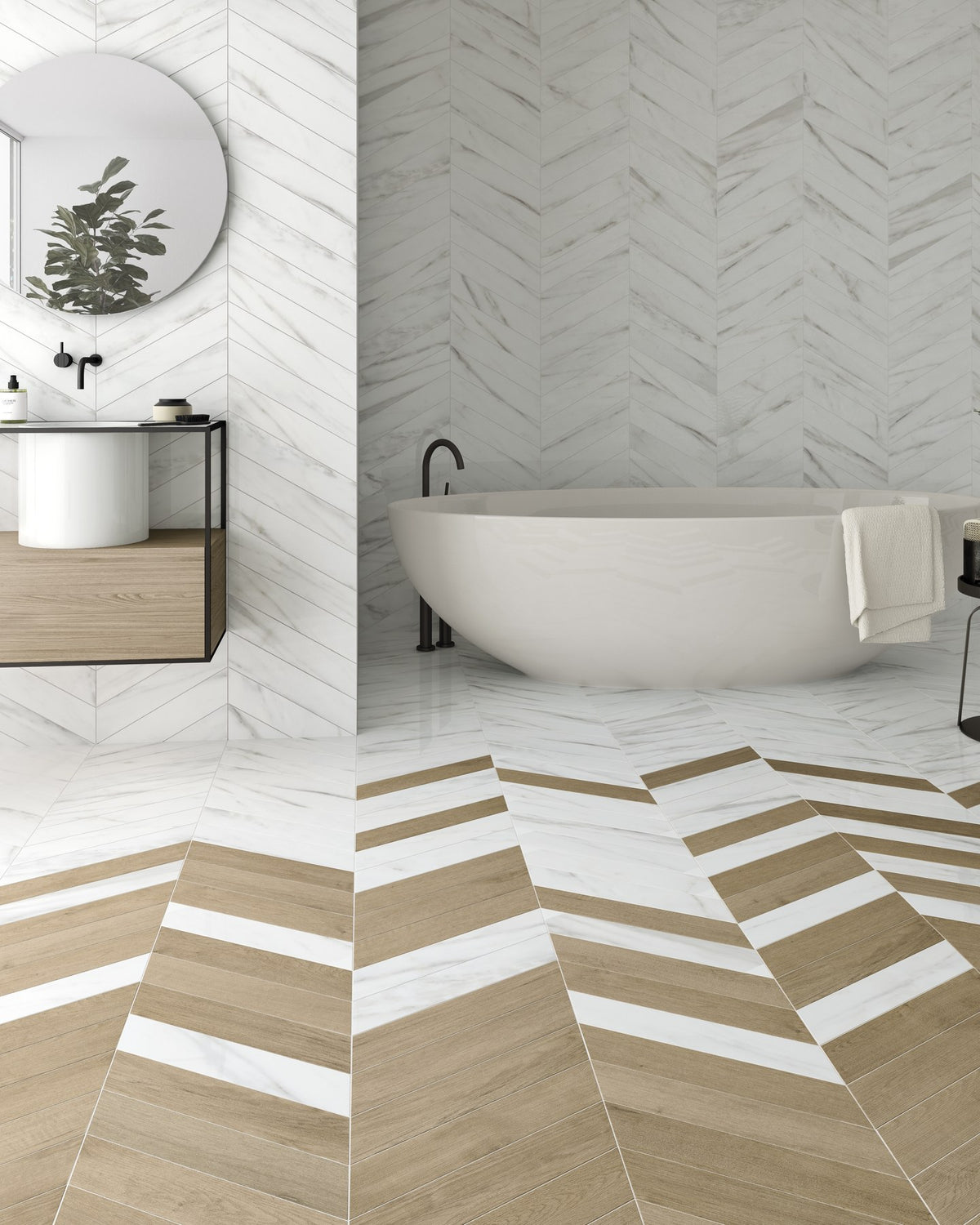 Rotterdam Porcelain Calacatta laid in a chevron across the walls and floor of a bathroom, mixed with wood effect chevron tiles around a freestanding bath