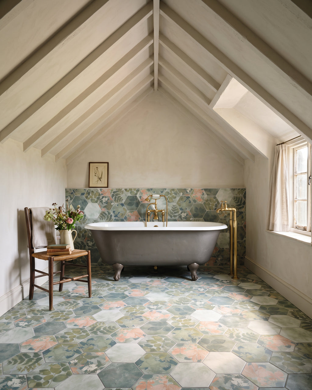 Woodland Glade Porcelain hexagons on the floor and as a dado behind a roll-top bath in a vaulted attic bathroom